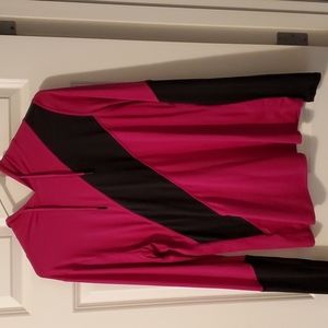 Long-sleeve Activewear with hood. Color is Magenta with black strip.